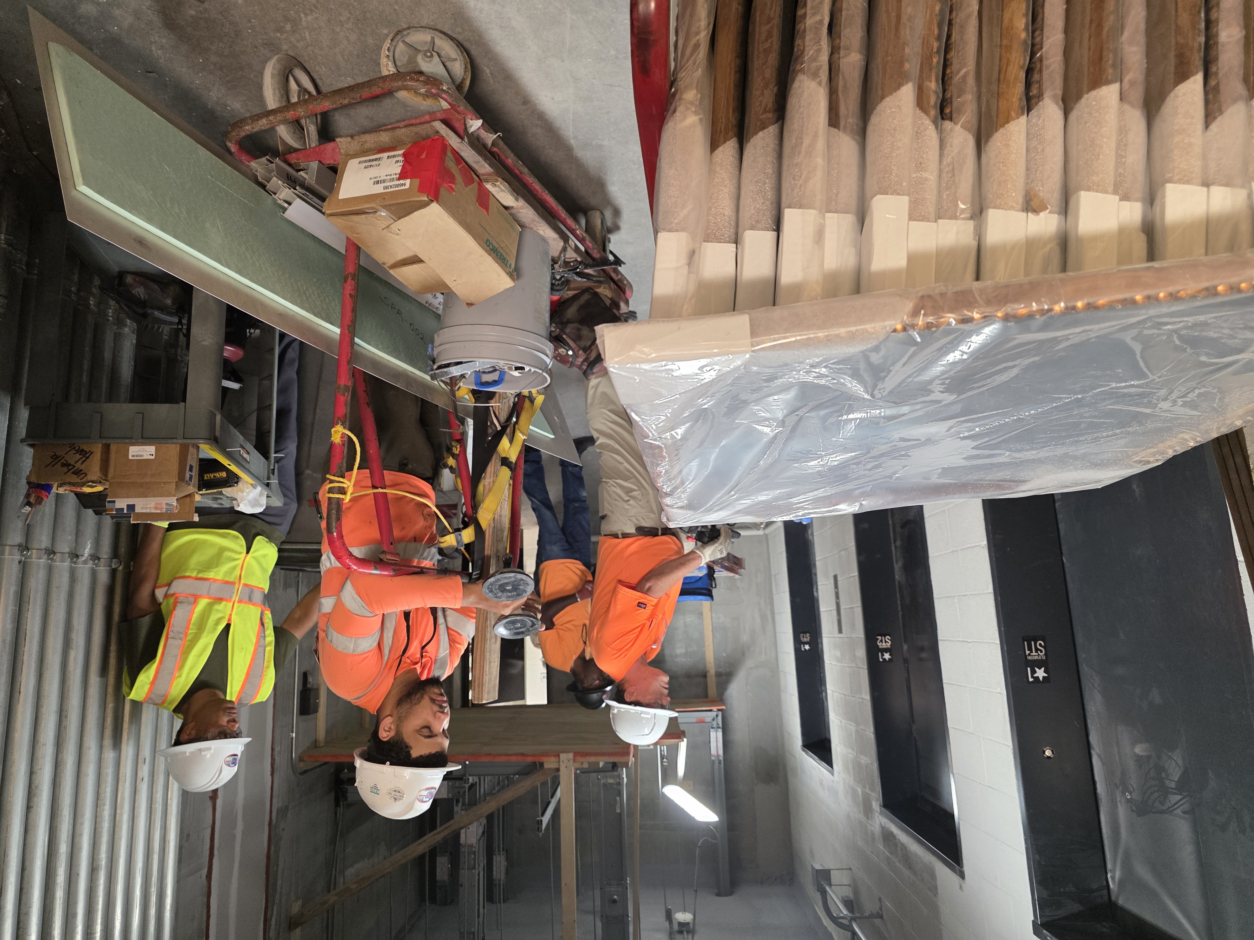 Eco Movers crew at work on a hotel installation